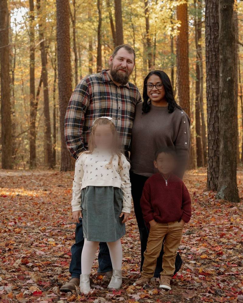 A quiet autumn family moment in the woods