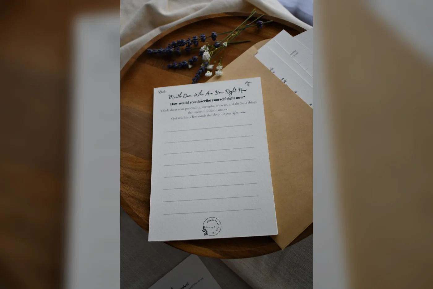Becoming You prompt card photographed with dried flowers and an envelope.