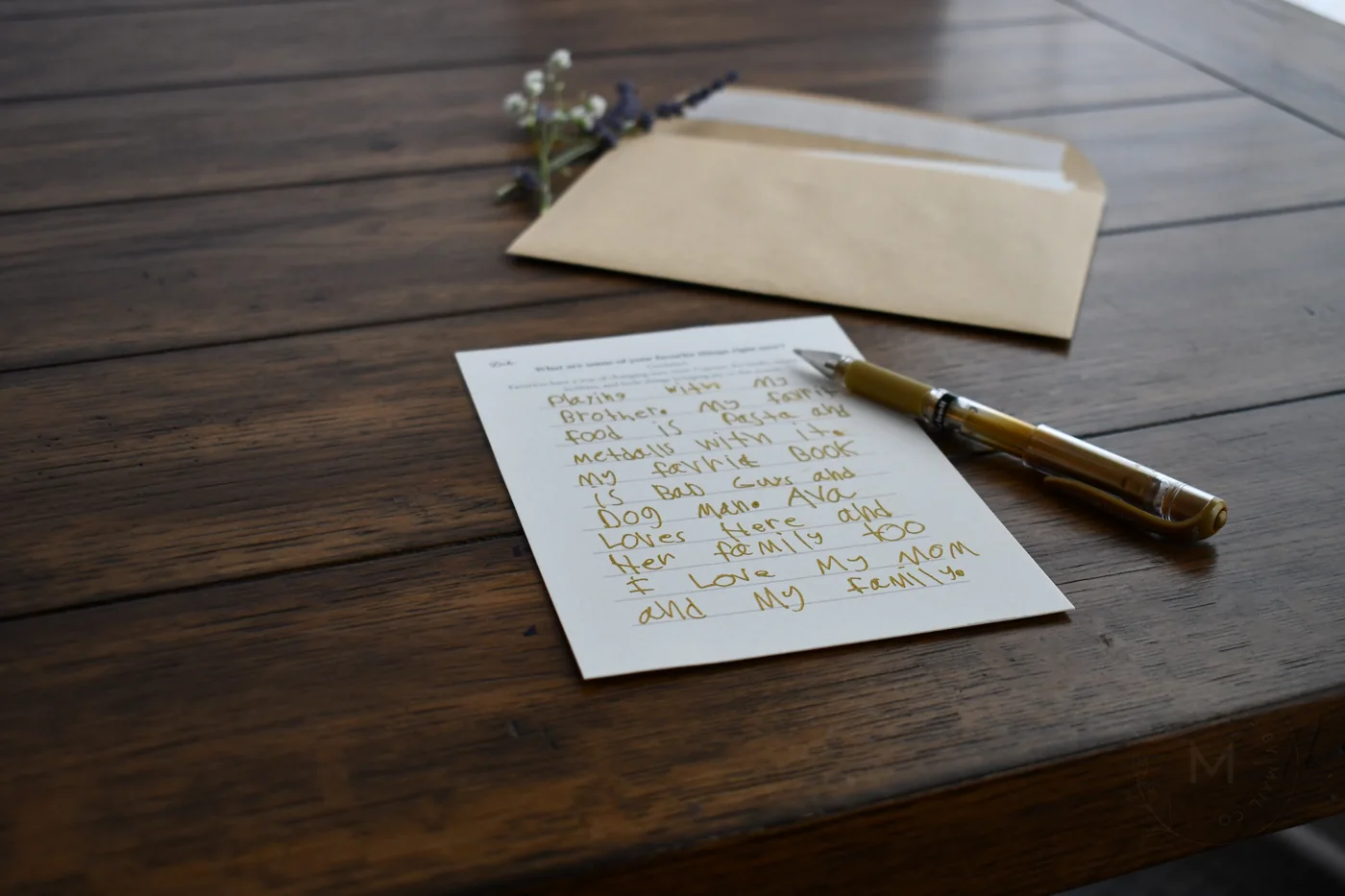 Completed Becoming You memory card with a pen and envelope.