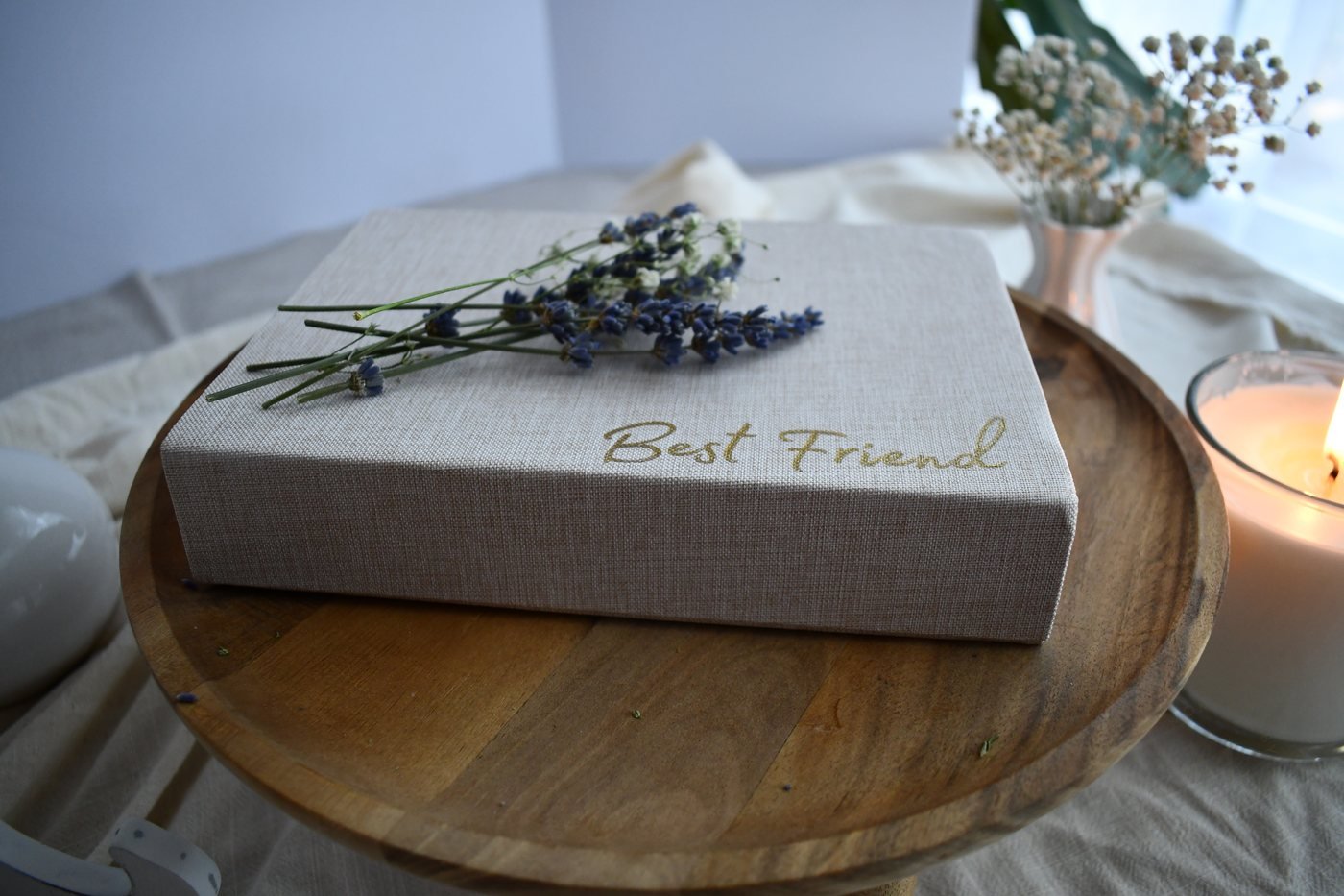 Best Friend keepsake box with lavender on a wooden table.