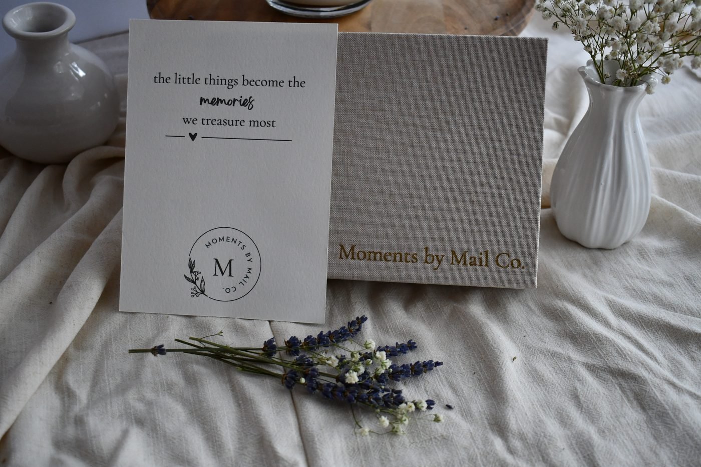 Memory Box detail with paper keepsakes and flowers.