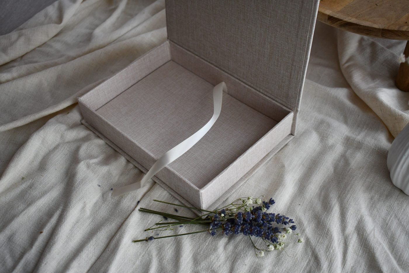 Memory Box lid and keepsake details on a styled surface.